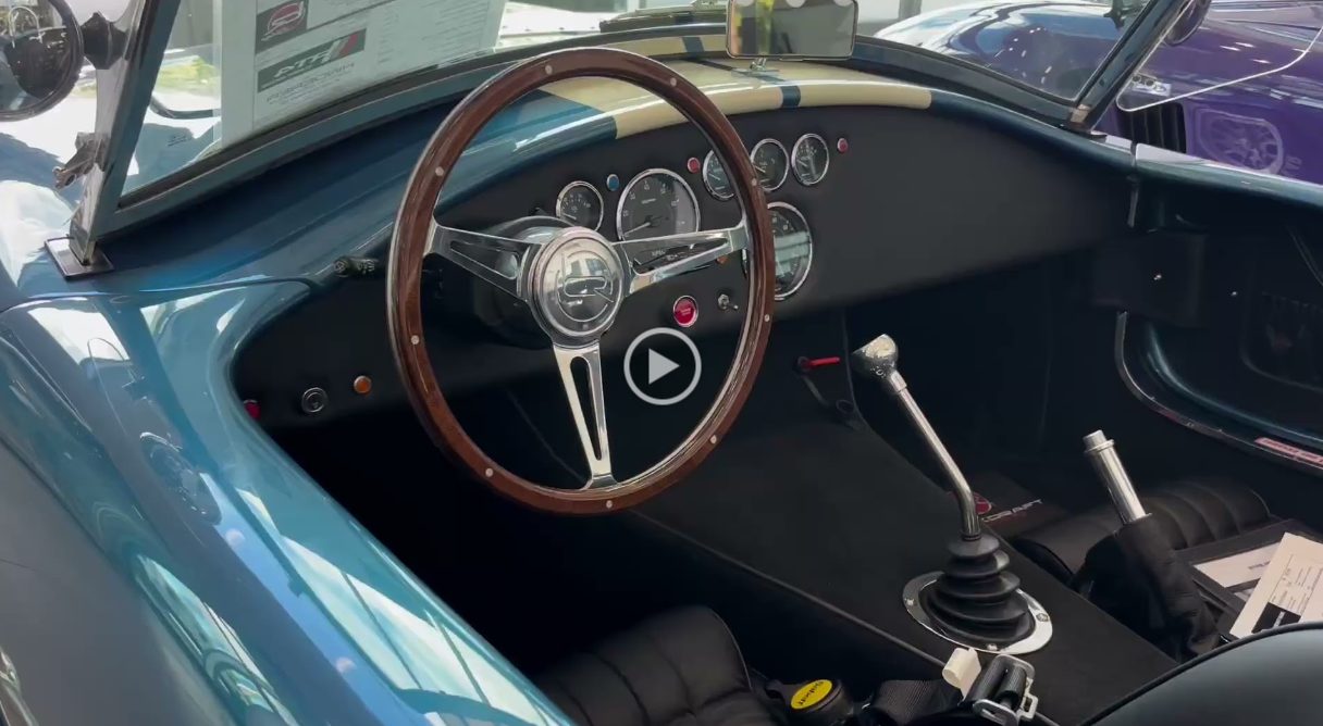 Steering wheel, dash and gauges seen from the passenger side